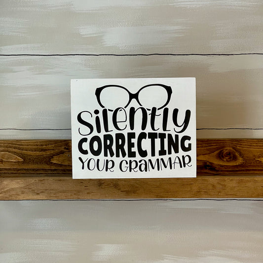 Silently Correcting Your Grammar Sign